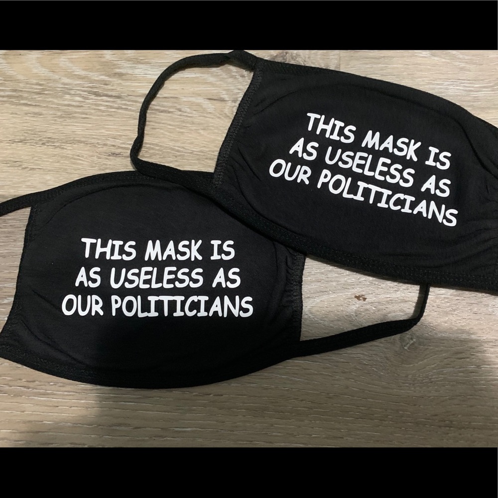 Set of two black face masks “this mask is useless”